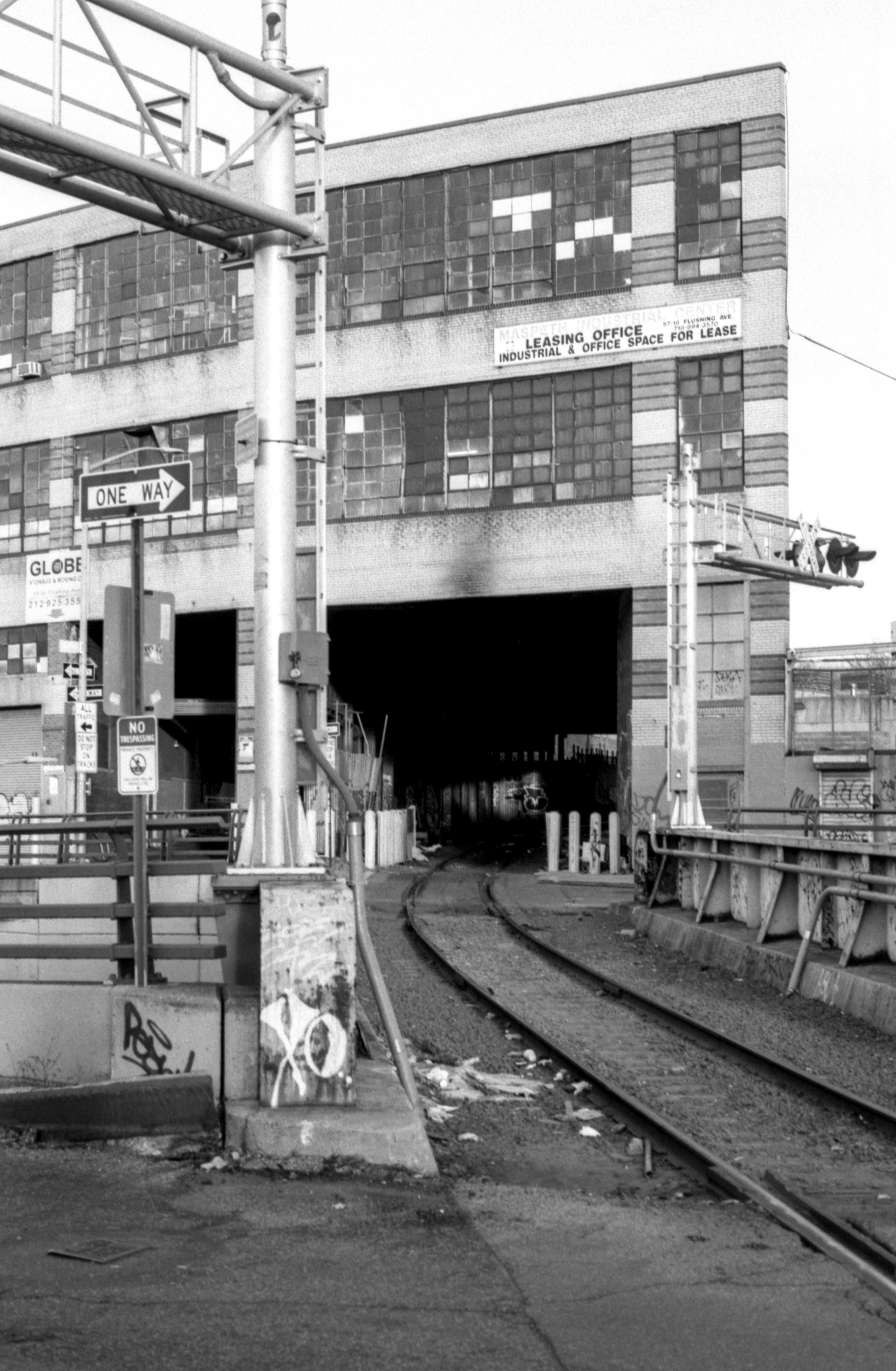 tracks cutting through building